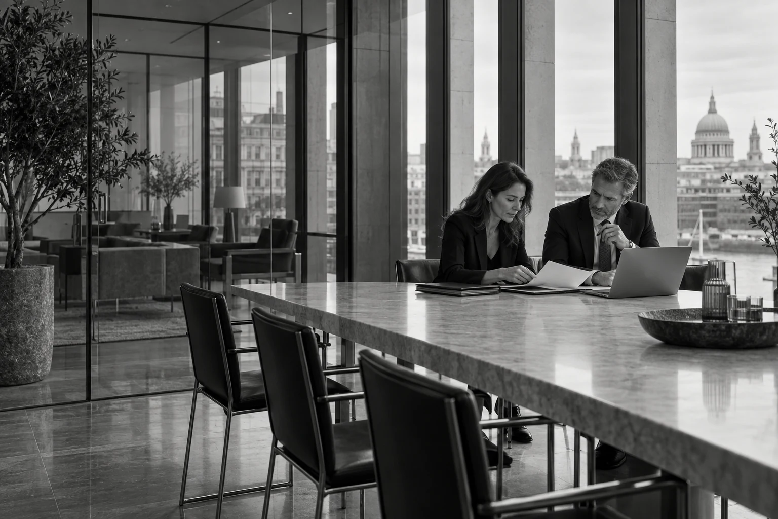 Professionals reviewing their business documents together